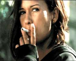 Rhona Mitra smoking